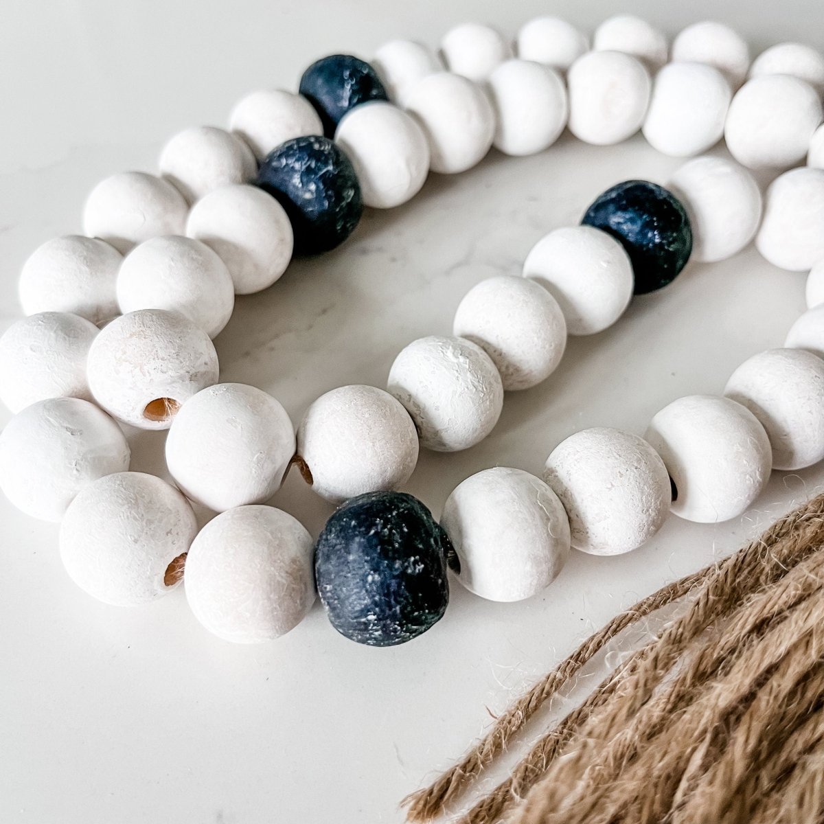 Whitewashed Wood Bead Garland with Jumbo Black Recycled Glass Beads - sonder and wolf