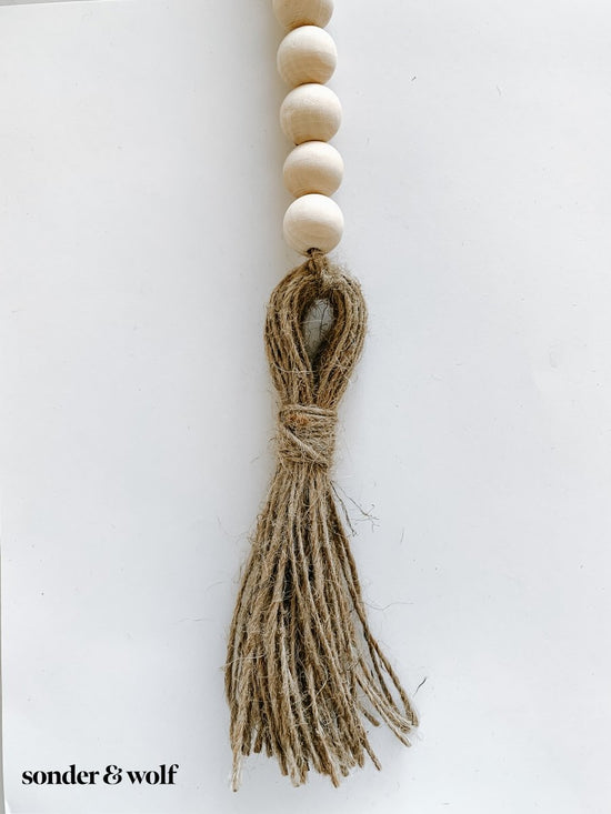 Wood Bead Garland with Jute Tassels - sonder and wolf
