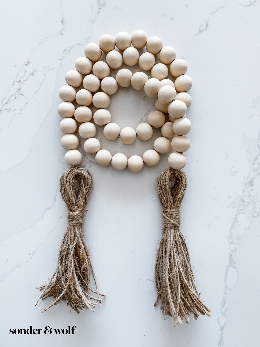 Wood Bead Garland with Jute Tassels - sonder and wolf