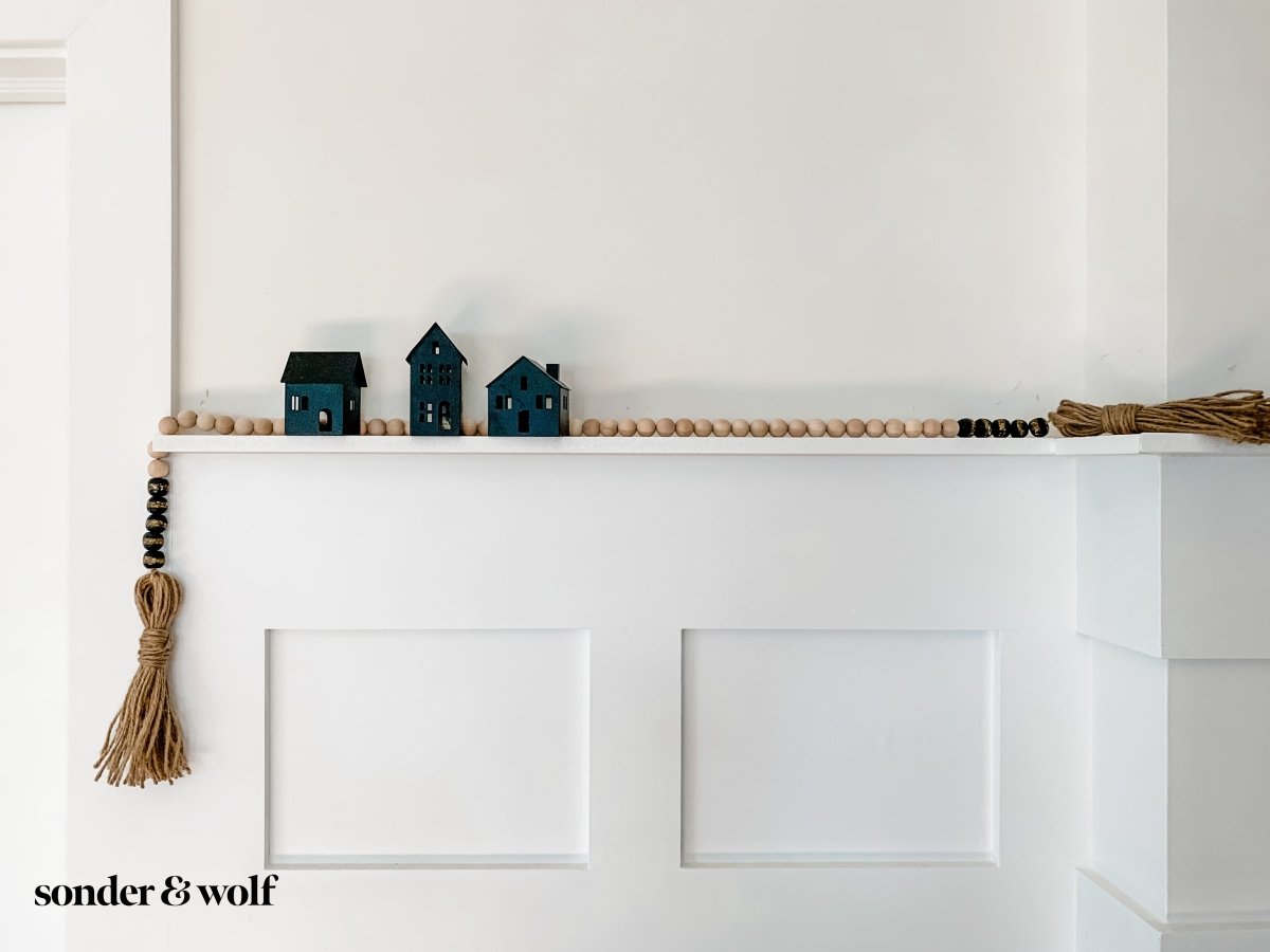 Load image into Gallery viewer, 4ft Wood Bead Garland with 10 Black Kente Krobo Beads - sonder and wolf
