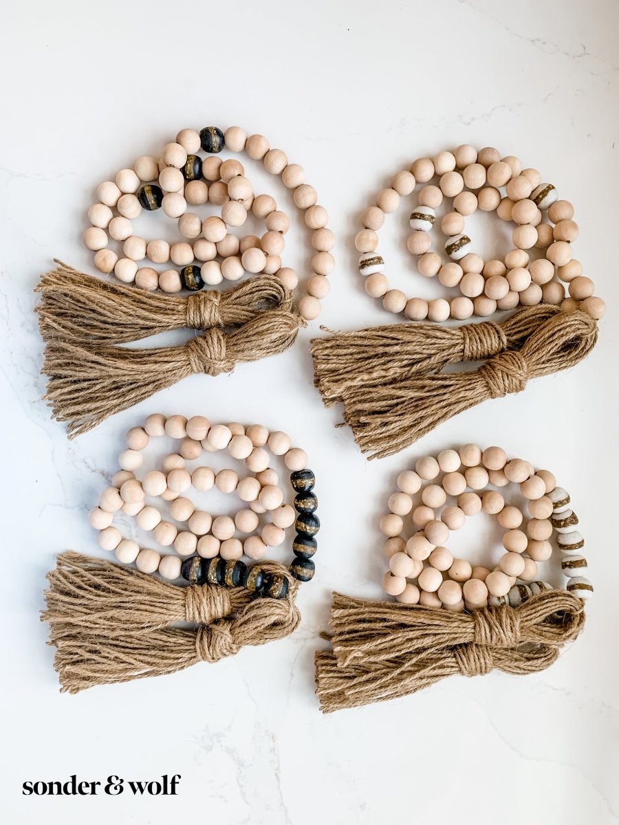 4ft Wood Bead Garland with 10 White Kente Krobo Beads - sonder and wolf