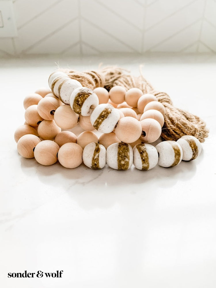 4ft Wood Bead Garland with 10 White Kente Krobo Beads - sonder and wolf
