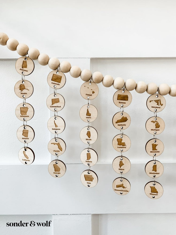 
                  
                    Bucket list States Wood Bead Garland - sonder and wolf
                  
                