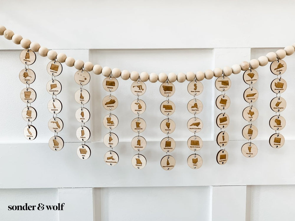 
                  
                    Bucket list States Wood Bead Garland - sonder and wolf
                  
                