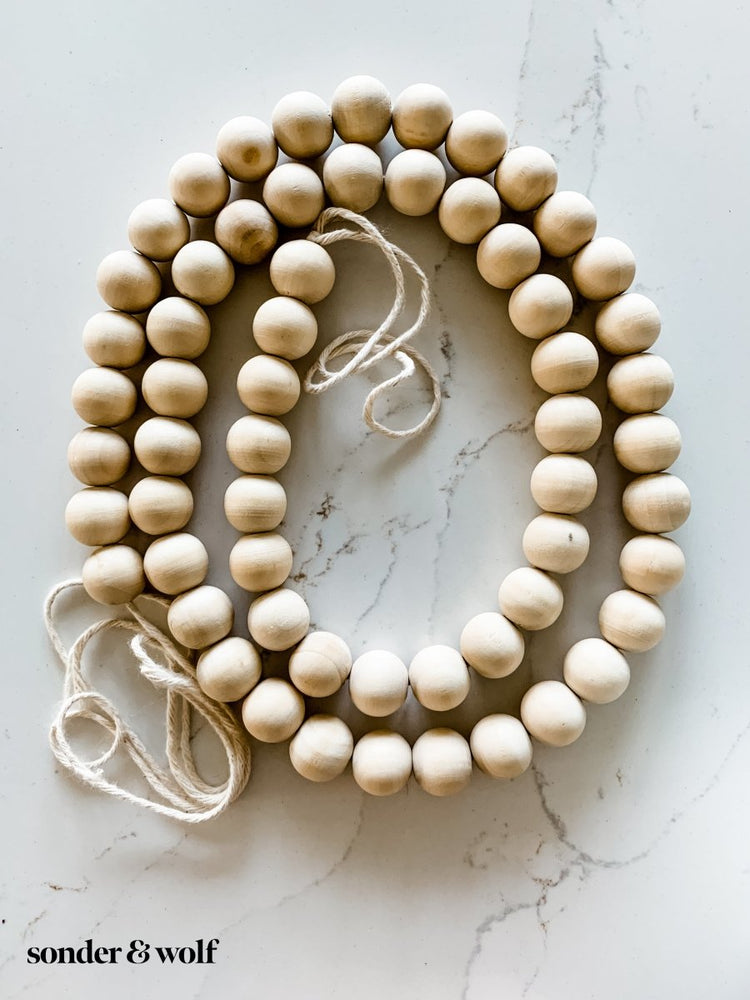 
                  
                    Bucket list States Wood Bead Garland - sonder and wolf
                  
                