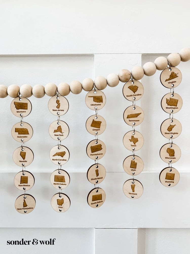 
                  
                    Bucket list States Wood Bead Garland - sonder and wolf
                  
                