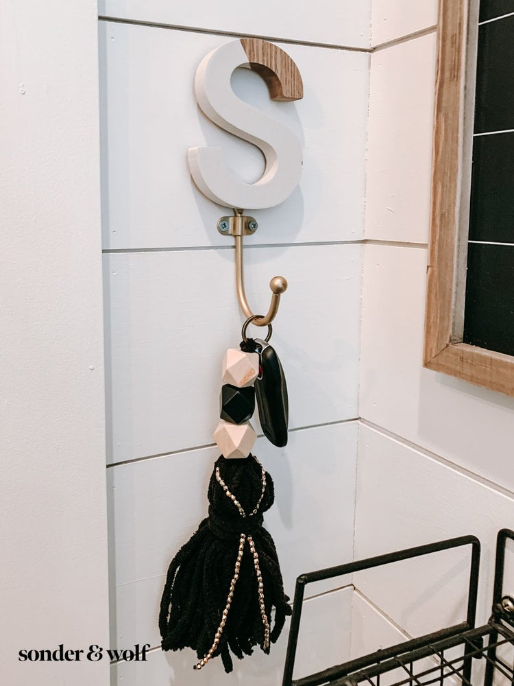 
                  
                    Geometric Keychain with Black Tassels - sonder and wolf
                  
                