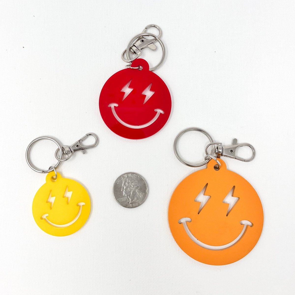 Load image into Gallery viewer, Lightning Smiley Face Keychain - sonder and wolf
