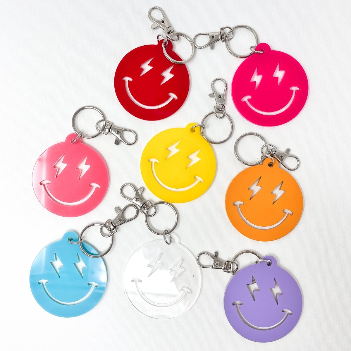 Load image into Gallery viewer, Lightning Smiley Face Keychain - sonder and wolf

