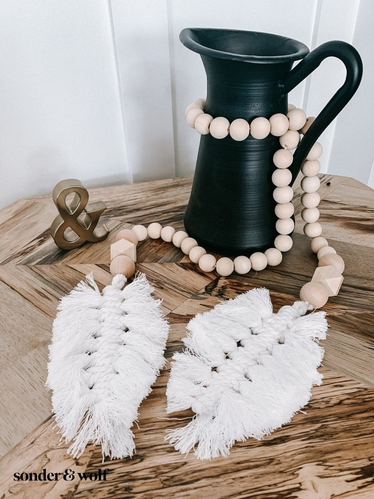 
                  
                    Macrame Feather Bead Garland - sonder and wolf
                  
                
