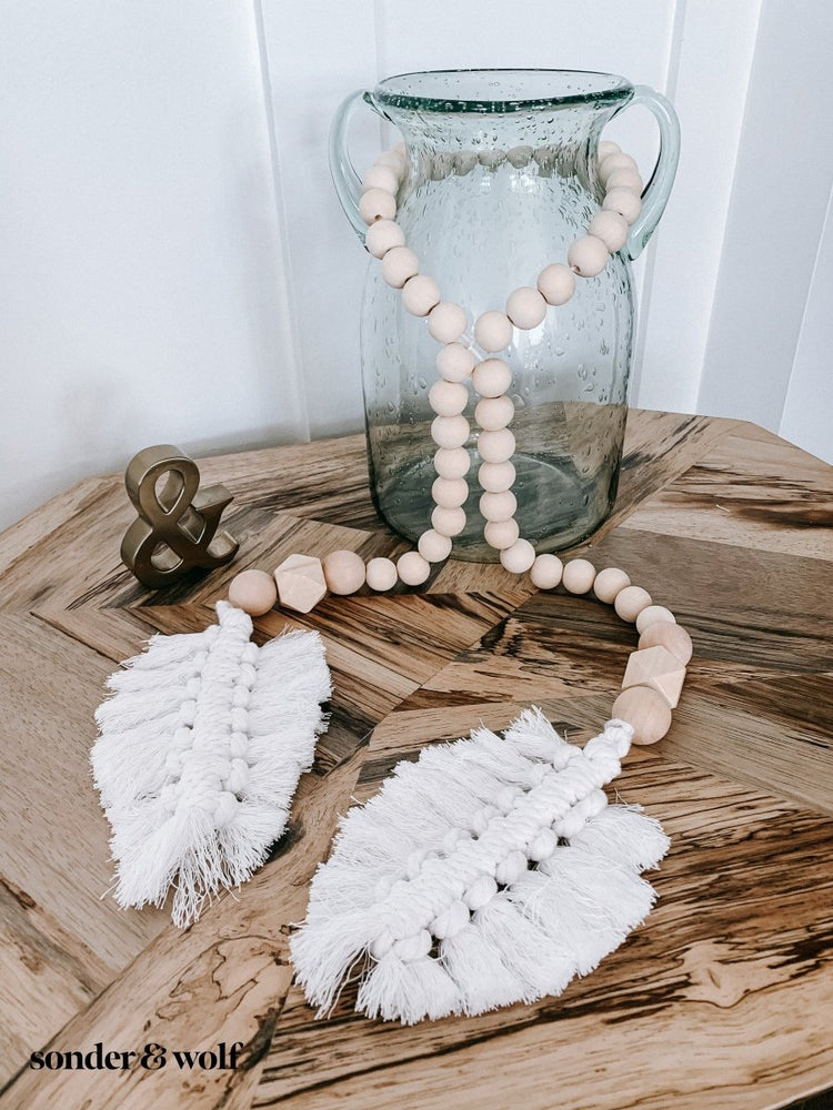 
                  
                    Macrame Feather Bead Garland - sonder and wolf
                  
                