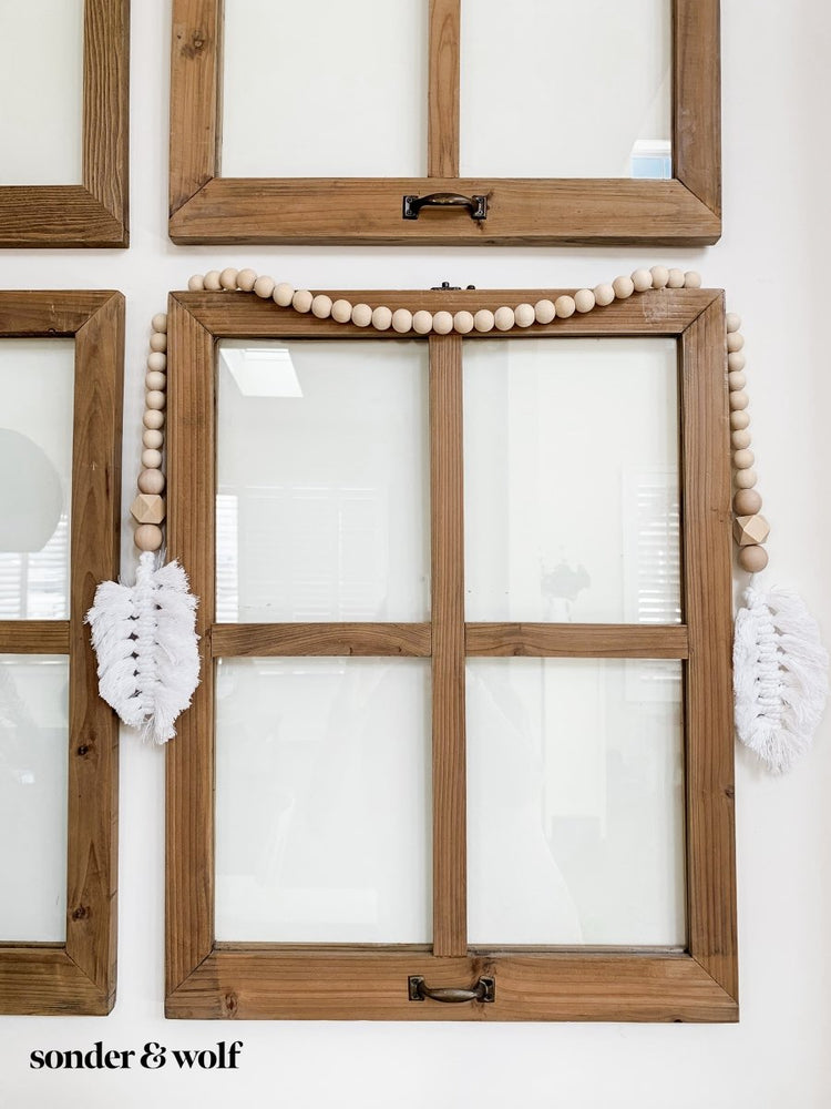 
                  
                    Macrame Feather Bead Garland - sonder and wolf
                  
                