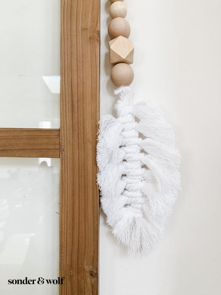 
                  
                    Macrame Feather Bead Garland - sonder and wolf
                  
                