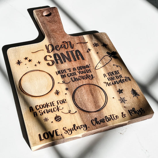 Load image into Gallery viewer, Personalized wood Santa tray cutting board - Santa treat board - sonder and wolf
