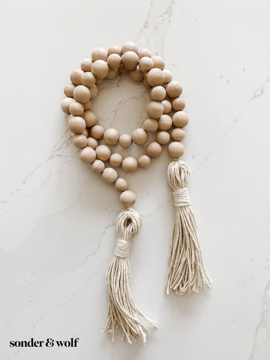 Variated Wood Bead Garland with Cotton Tassels - sonder and wolf
