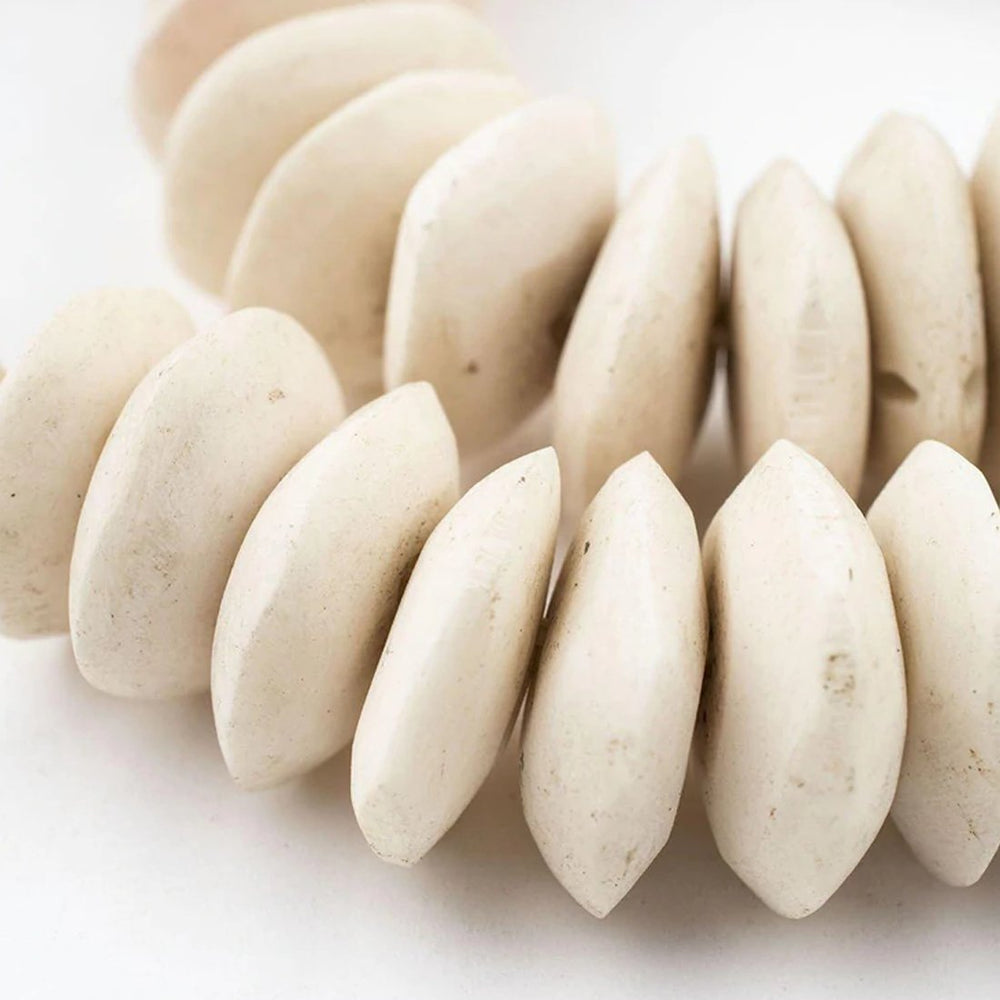 
                  
                    White Bone Saucer Beads Garland - sonder and wolf
                  
                
