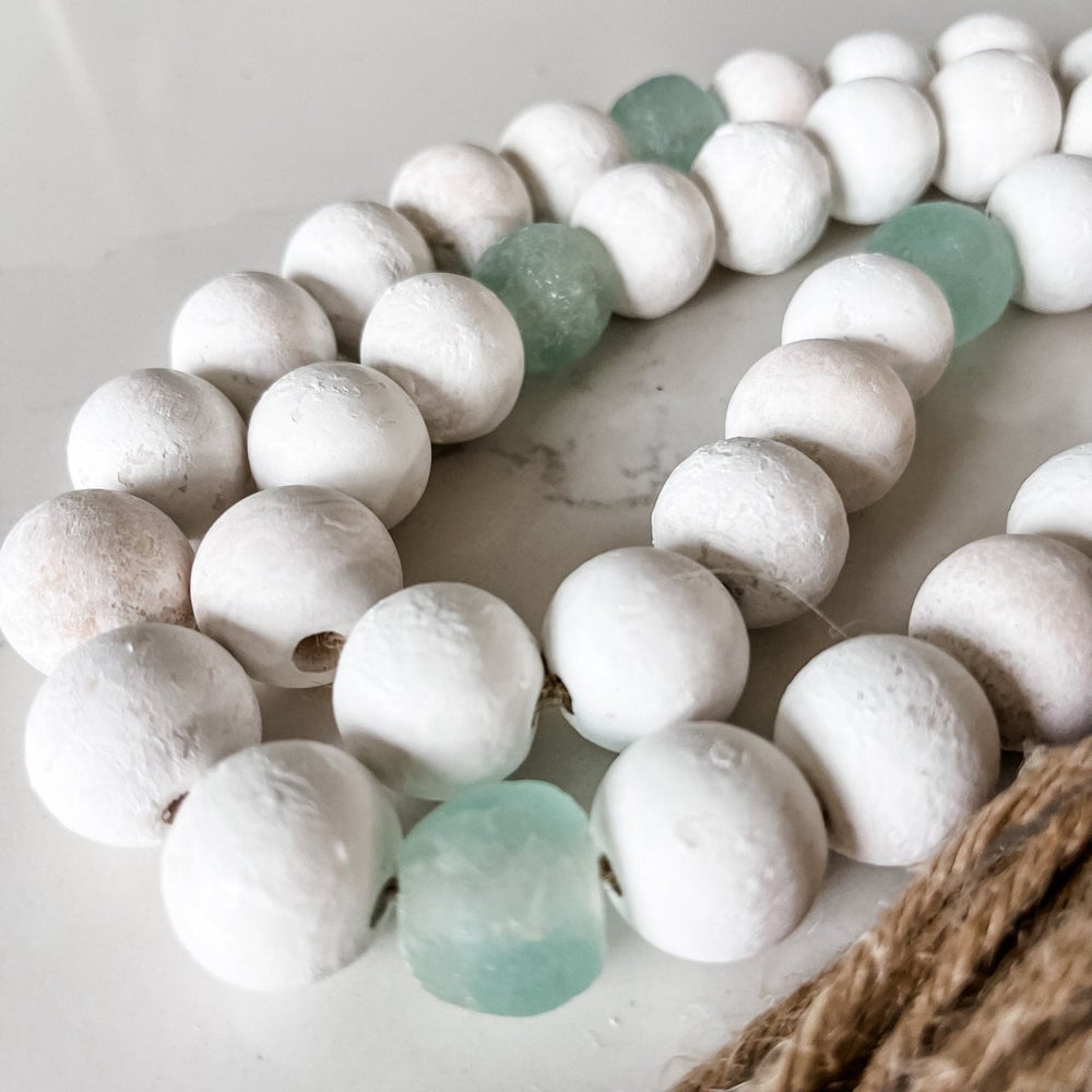 
                  
                    Whitewashed Wood Bead Garland with Jumbo Aqua Recycled Glass Beads - sonder and wolf
                  
                