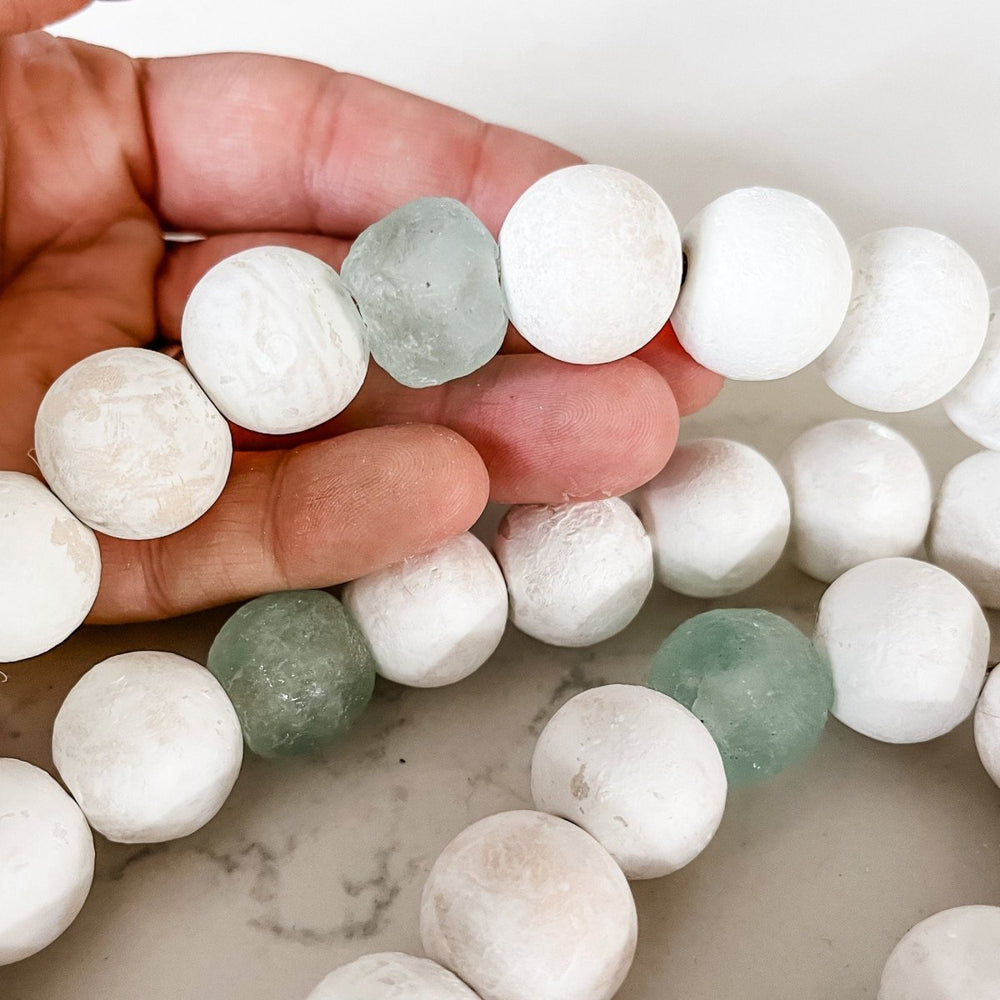 
                  
                    Whitewashed Wood Bead Garland with Jumbo Aqua Recycled Glass Beads - sonder and wolf
                  
                