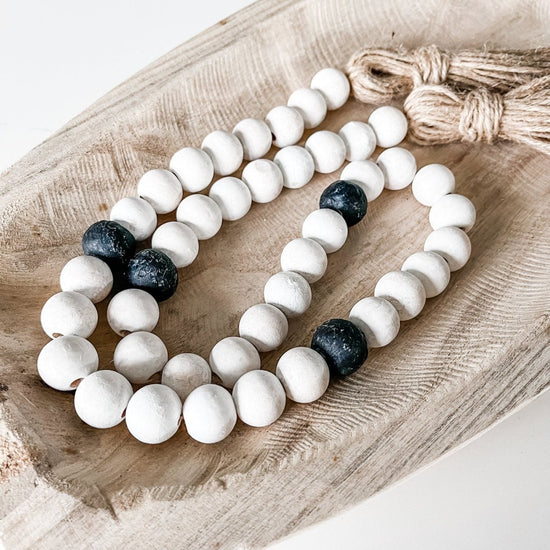 Load image into Gallery viewer, Whitewashed Wood Bead Garland with Jumbo Black Recycled Glass Beads - sonder and wolf
