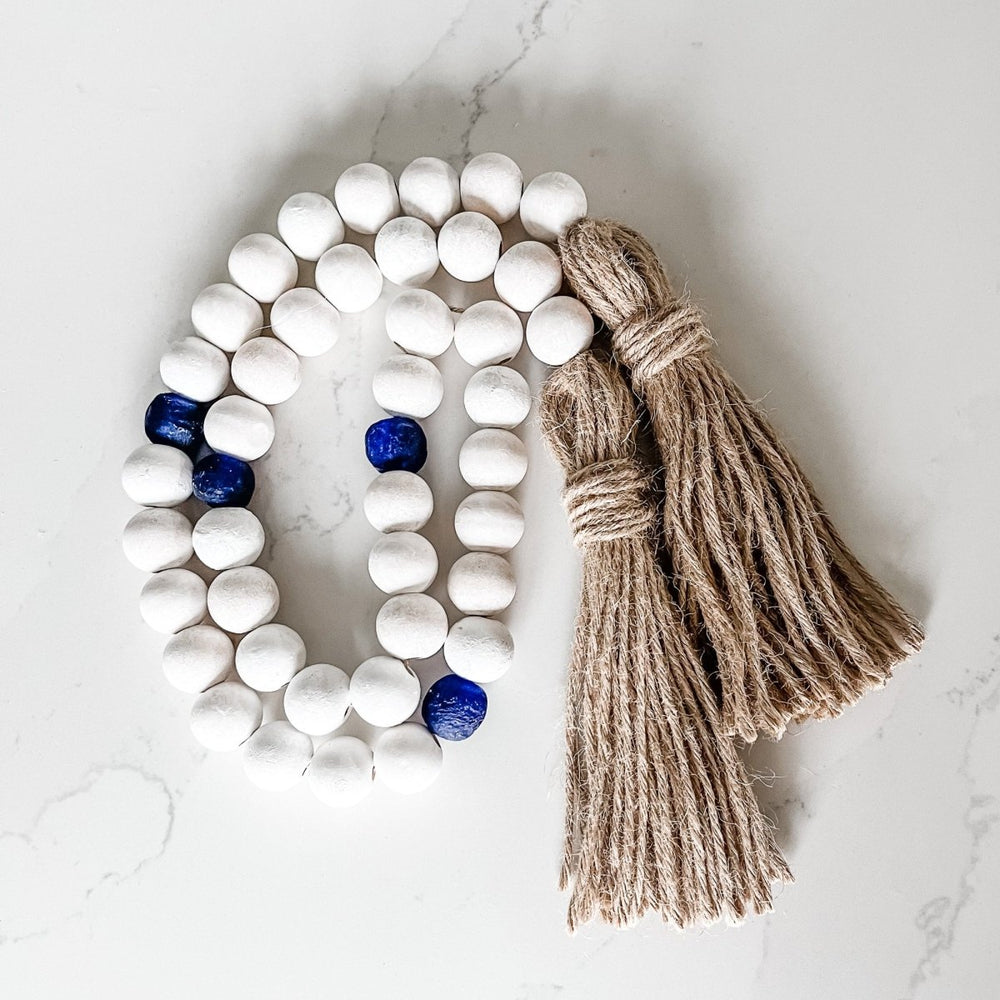 
                  
                    Whitewashed Wood Bead Garland with Jumbo Cobalt Blue Recycled Glass Beads - sonder and wolf
                  
                