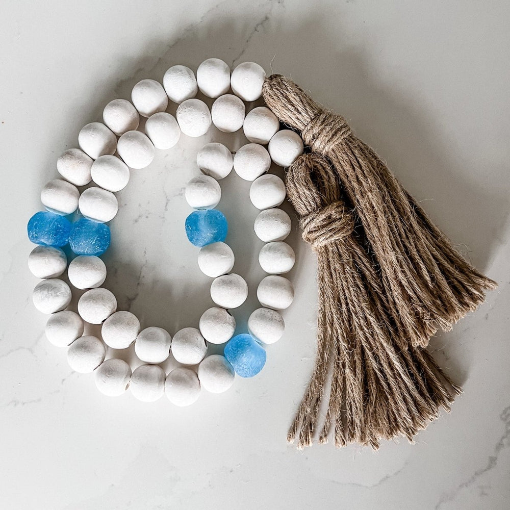 
                  
                    Whitewashed Wood Bead Garland with Jumbo Ice Blue Recycled Glass Beads - sonder and wolf
                  
                