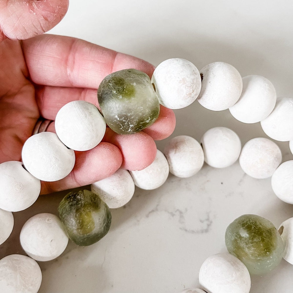 
                  
                    Whitewashed Wood Bead Garland with Jumbo Olive Green Recycled Glass Beads - sonder and wolf
                  
                