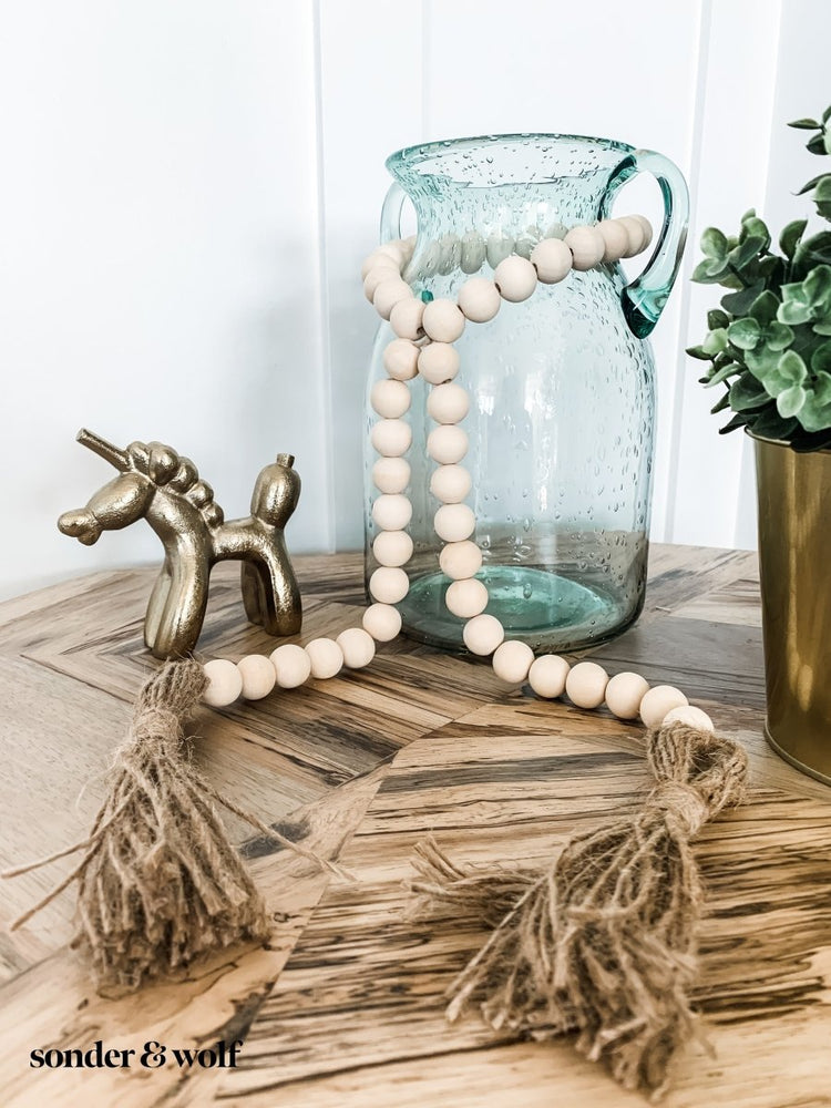 
                  
                    Wood Bead Garland with Jute Tassels - sonder and wolf
                  
                