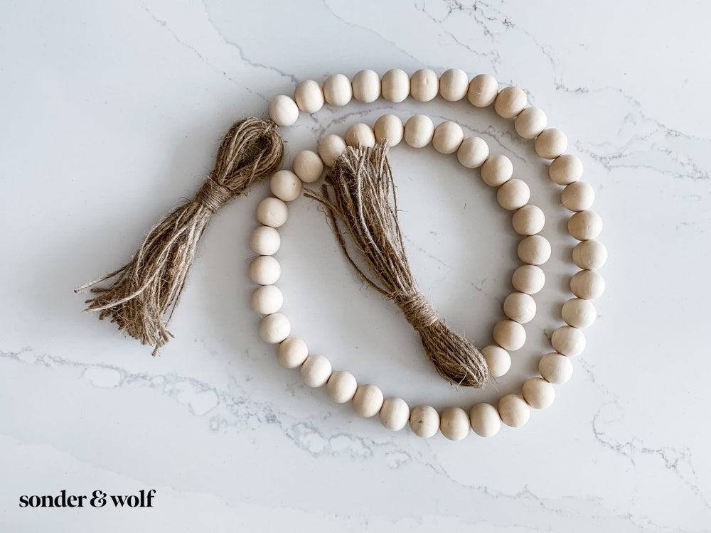 
                  
                    Wood Bead Garland with Jute Tassels - sonder and wolf
                  
                