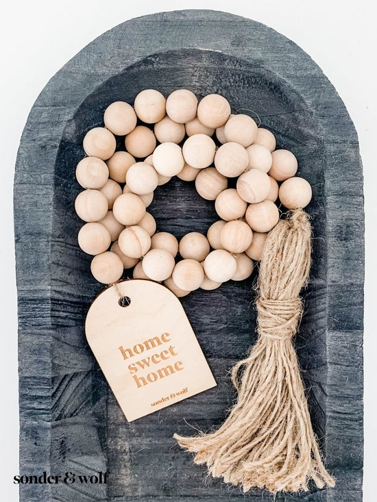 Load image into Gallery viewer, Wood Bead Garland with Wood Charm &amp;amp; Jute Tassel - sonder and wolf
